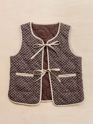 Quilted cotton vest in reversible brown celestial stripe